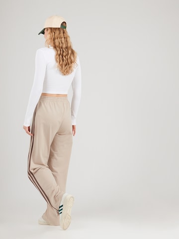 ADIDAS ORIGINALS Loosefit Ráncos nadrág 'Firebird' - bézs