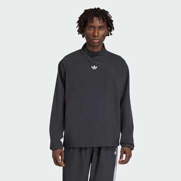 ADIDAS ORIGINALS Tussenjas 'Adicolor' in Zwart