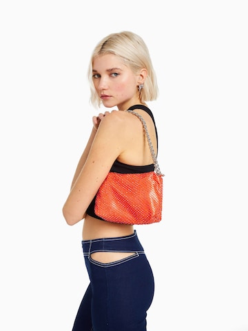 Bershka Schultertasche in Orange