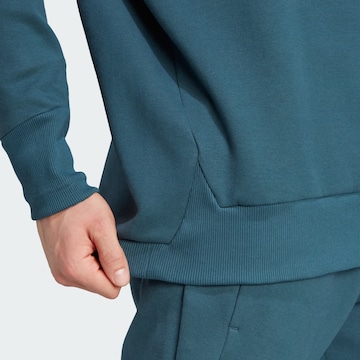 mėlyna ADIDAS SPORTSWEAR Sportinio tipo megztinis 'Z.N.E. Premium'