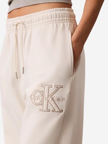 Wide leg Pantaloni sportivi 'LV047G822G' di Calvin Klein Jeans in beige