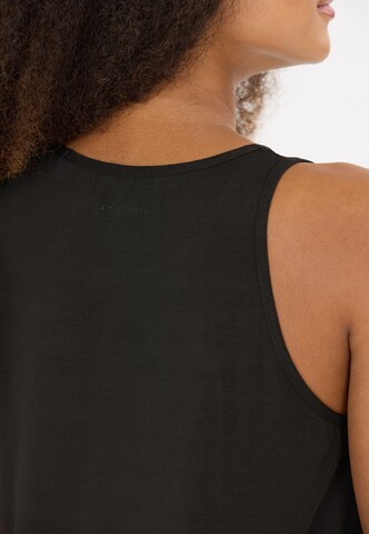 Athlecia Sports top 'Mota V2' in Black