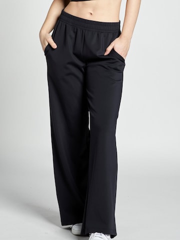 SPORTKIND Flared Workout Pants 'Trainingshose weit' in Black: front