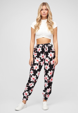Cloud5ive Zwężany krój Spodnie w kolorze czarny