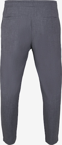 Urban Classics Regularen Kargo hlače | siva barva
