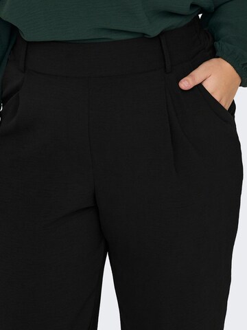 Wide leg Pantaloni con pieghe 'CARMETTA' di ONLY Carmakoma in nero