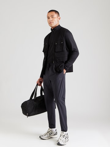 new balance Slimfit Παντελόνι φόρμας σε μαύρο