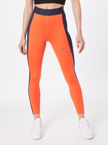 PUMA Skinny Workout Pants in Orange: front
