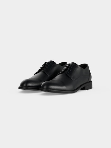 Scarpa stringata 'Tayil' di BOSS in nero