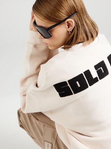 Karo Kauer - Sudadera 'Sold Out' en blanco