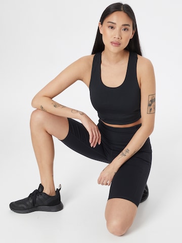 SKECHERS Skinny Sportbroek in Zwart