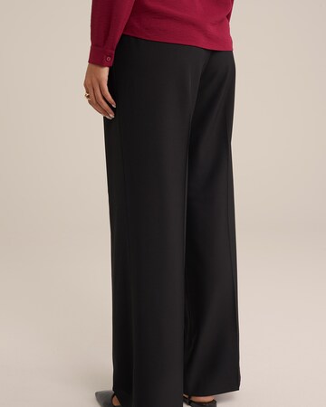 Wide leg Pantaloni con piega frontale di WE Fashion in nero