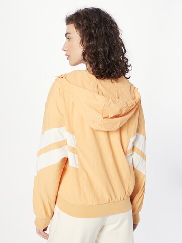 Urban Classics Prehodna jakna 'Crinkle Batwing' | oranžna barva