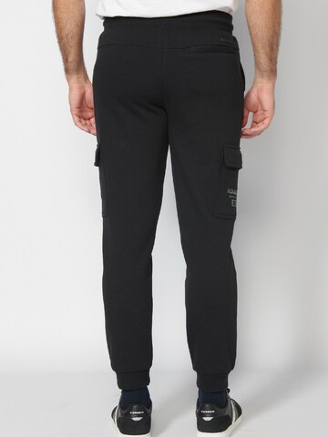 KOROSHI - Tapered Calças cargo em preto