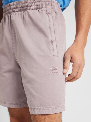 ADIDAS ORIGINALS Loose fit Trousers 'ESS+' in Purple
