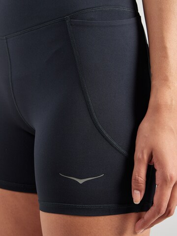 HOKA Skinny Urheiluhousut 'ELARO 5' värissä musta
