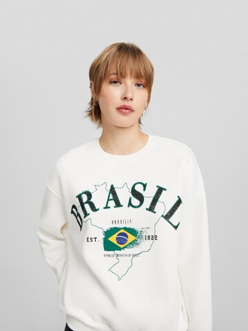 Sweat-shirt Bershka en blanc