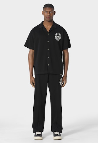 Loosefit Pantaloni 'REVON' di Pas De Monaco in nero: frontale