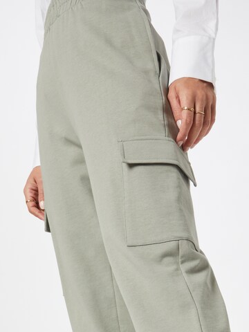 Tapered Pantaloni 'Lexa' di ABOUT YOU in verde