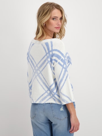 Pullover di monari in bianco