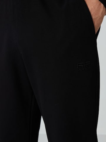 Tommy Life Joggingpak in Zwart
