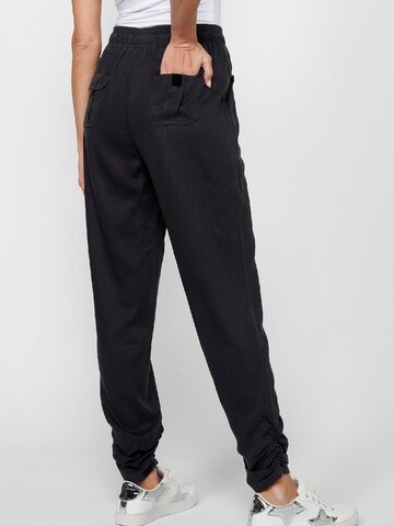 KOROSHI Loosefit Sporthose in Schwarz