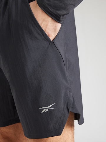 Regular Pantalon de sport Reebok en noir