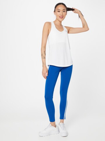 Reebok Skinny Športové nohavice - Modrá