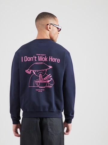 WoodbirdSweater majica 'Cane Wok' - plava boja: prednji dio