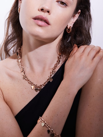 Echtzeit Earrings in Gold: front