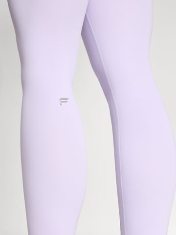 Fabletics Skinny Urheiluhousut 'PURELUXE' värissä lila
