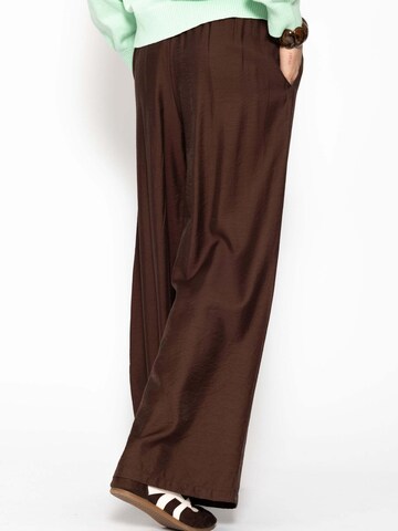 SASSYCLASSY Loose fit Trousers in Brown