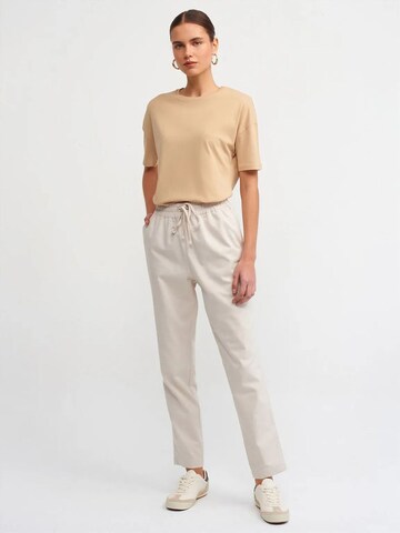 Maglietta di Dilvin in beige