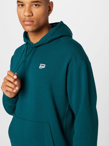 PUMA - Sweatshirt de desporto em verde