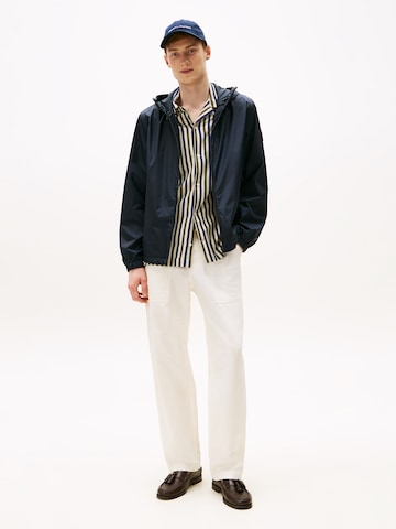 TOMMY HILFIGER Φθινοπωρινό και ανοιξιάτικο μπουφάν σε μπλε