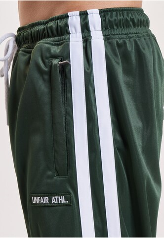 Loosefit Pantaloni sportivi 'DMWU Evolution' di Unfair Athletics in verde