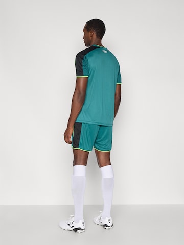 UNDER ARMOUR Loosefit Sportbroek 'Challenger' in Groen