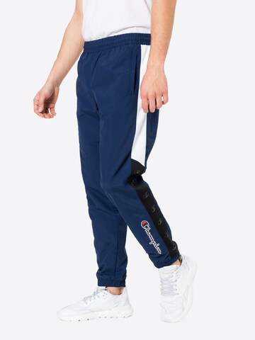 Champion Authentic Athletic Apparel Tapered Sports trousers in Blue: front