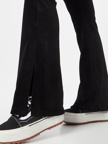 Karl Kani جينز ذات سيقان واسعة سراويل بلون أسود