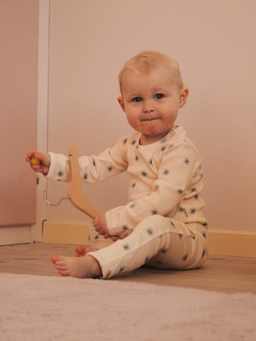 LouieLouie Sparkdräkt/body 'Louie Margueritte' i beige