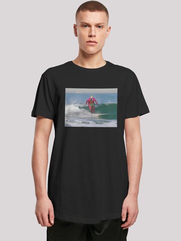 F4NT4STIC T-Shirt 'Batman TV Series Joker Surfing' in Schwarz: Vorderseite