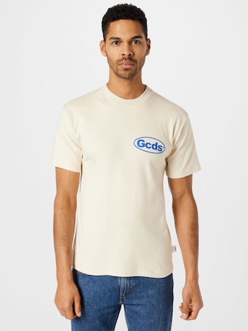 GCDS - Camiseta en beige: frente