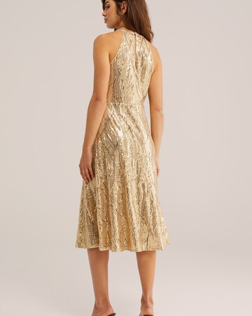 WE Fashion Φόρεμα κοκτέιλ σε χρυσό