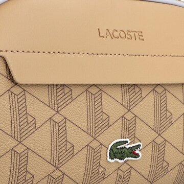 LACOSTE Toilettas in Bruin