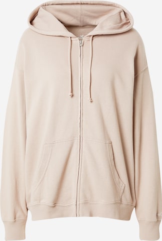 Veste de survêtement HOLLISTER en beige : devant