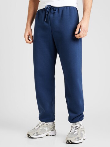 new balance - Tapered Pantalón en azul: frente