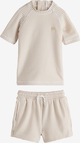 Next UV-suoja värissä beige: etupuoli