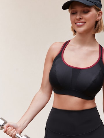 Next Bustier Urheilurintaliivit värissä musta
