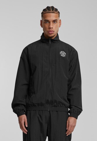 Giacca di mezza stagione 'Essential' di Karl Kani in nero