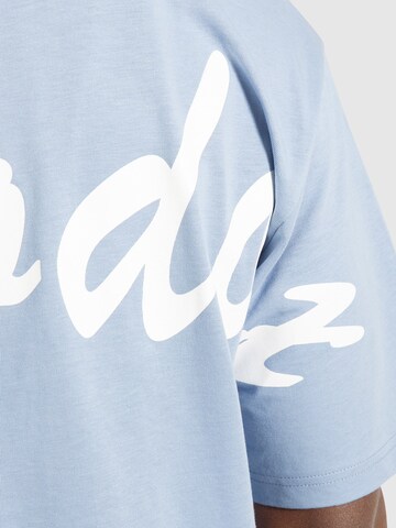 Smilodox Oversize T-Shirt ' Liquid Brail ' in Blau